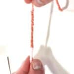 Pulling yarn to ungather it