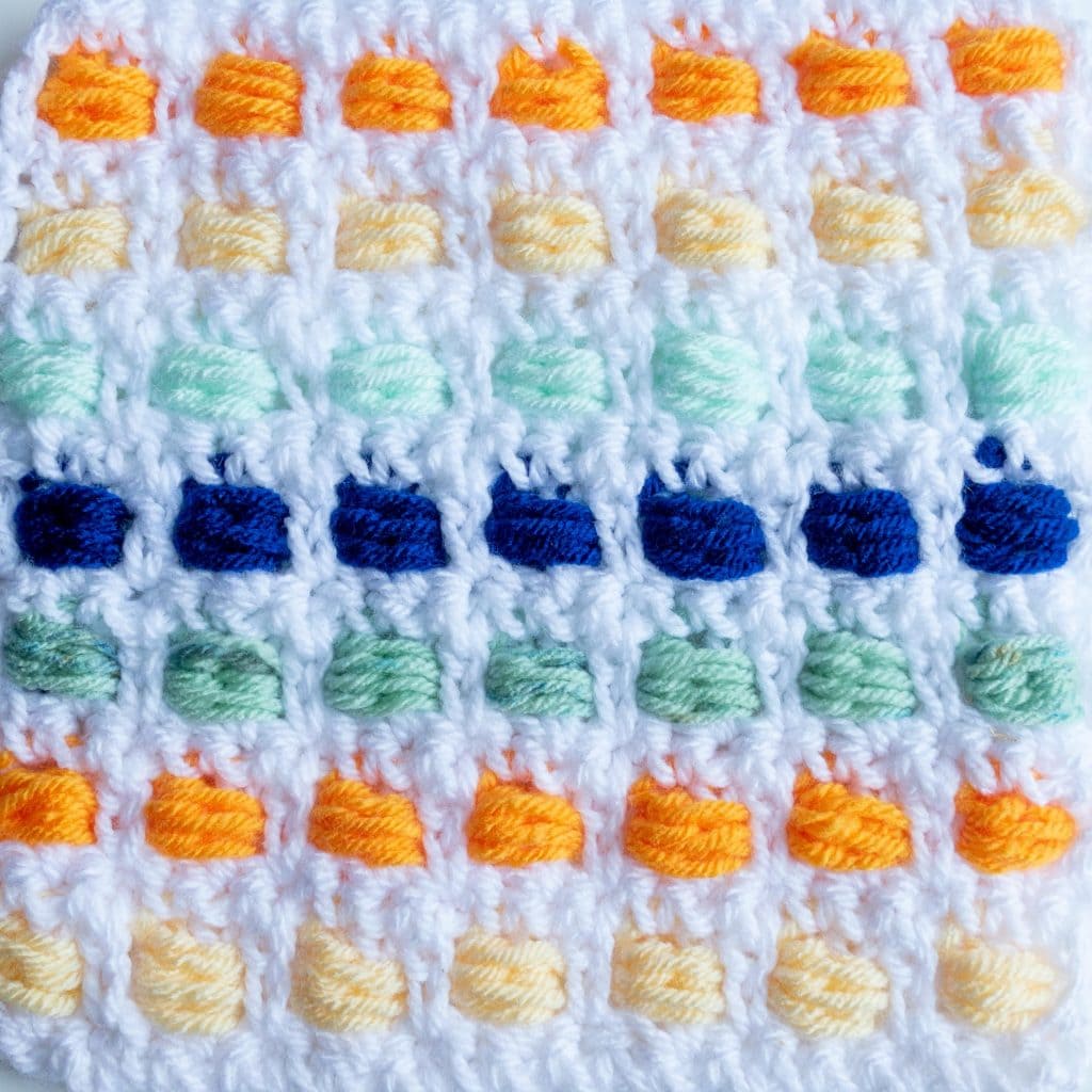 flat lay of a colorful piece of boxed bead stitch crochet