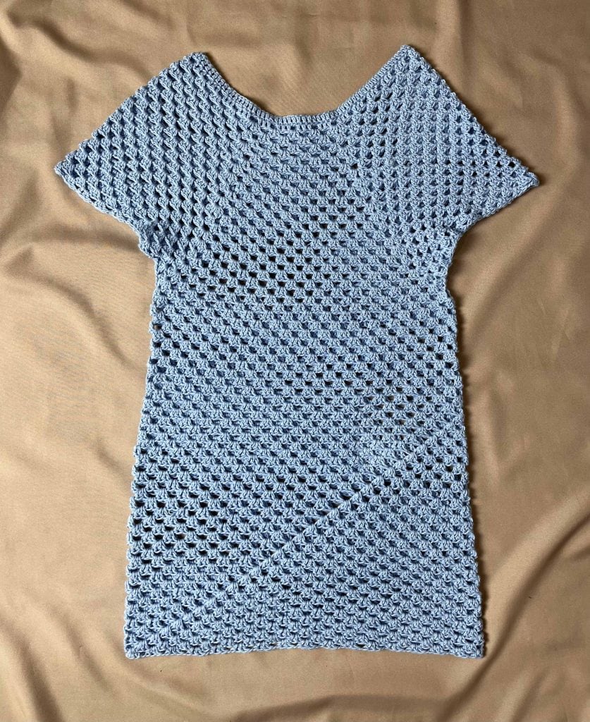 Full granny stitch short dress being displayed 