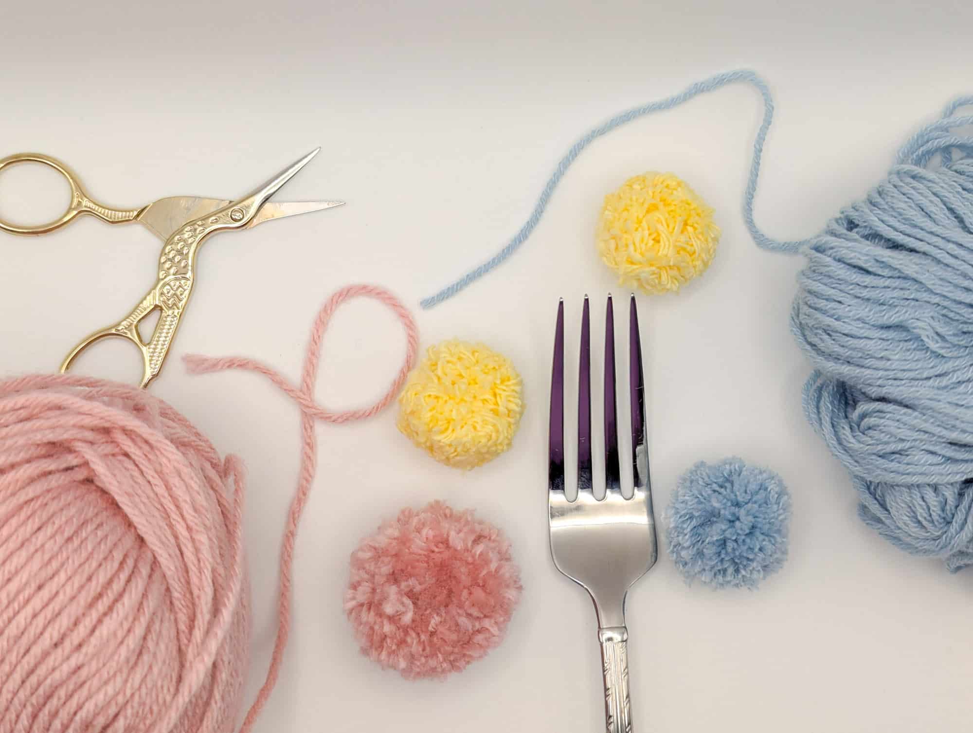How to Make quick little Pom Poms Using Just a Fork (No Special Tools ...